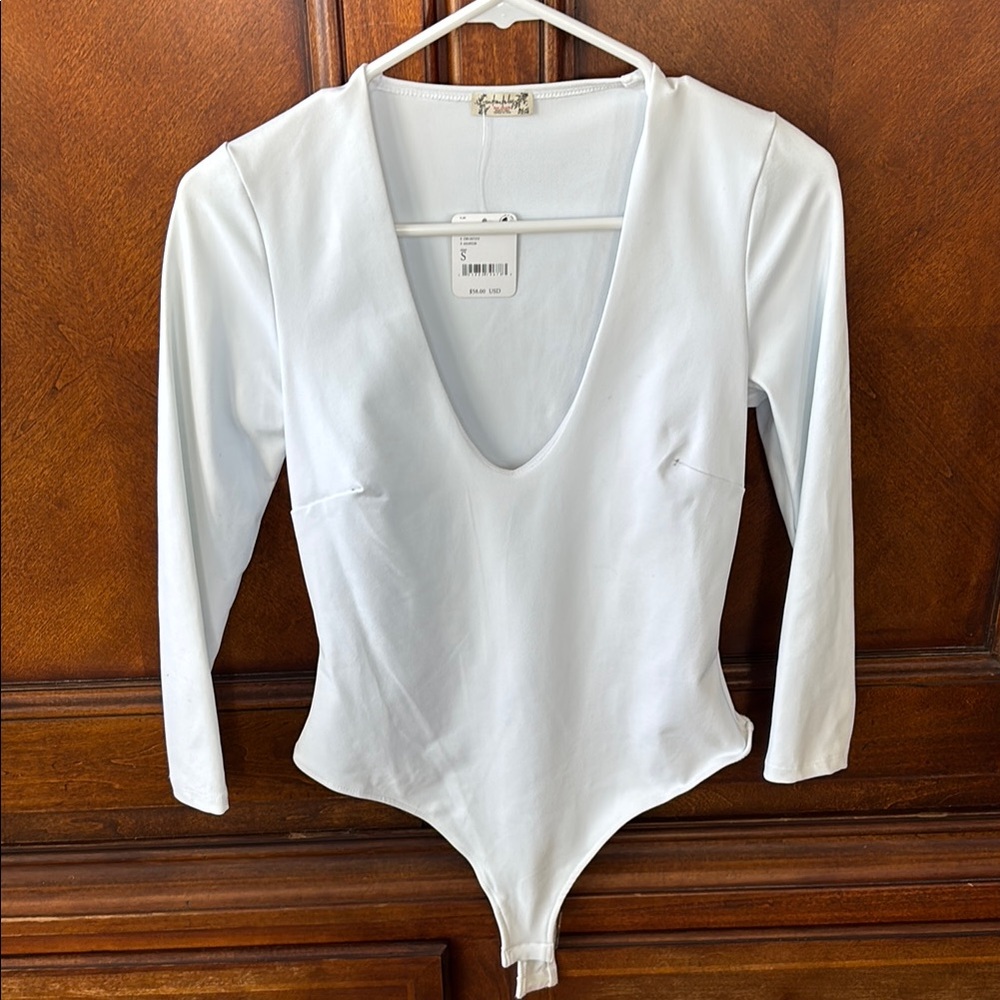 Free People- 4 for $20 Bodysuits (4) sold together or sold individually $5 each